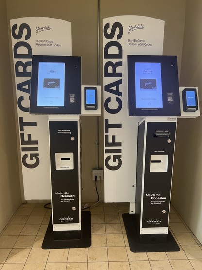 Two gift card ATMs that convert money into gift cards that can only be spent in one physical mall.